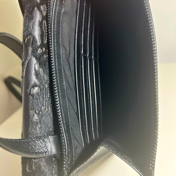 Alexander Wang
Ponyhair-Trimmed Leather Crossbody Bag - Picture 5 of 9